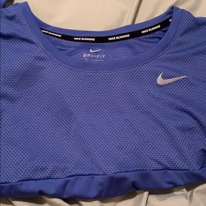 Nike running top. Purplish blue. Size M